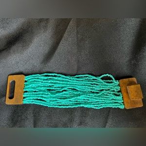 Pretty Vintage Turquoise beaded Bracelet with wood clasp.